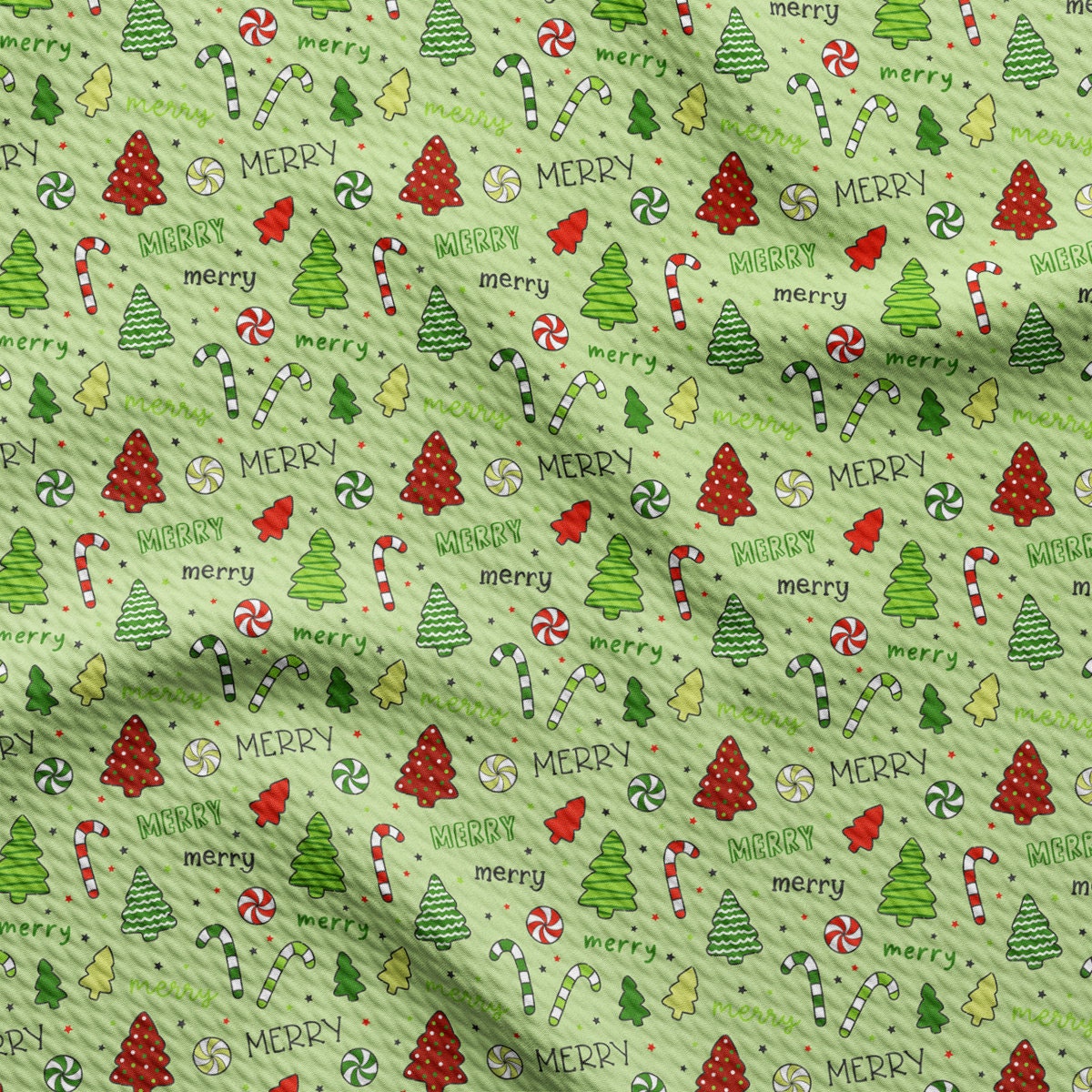 a green background with christmas trees and candy canes