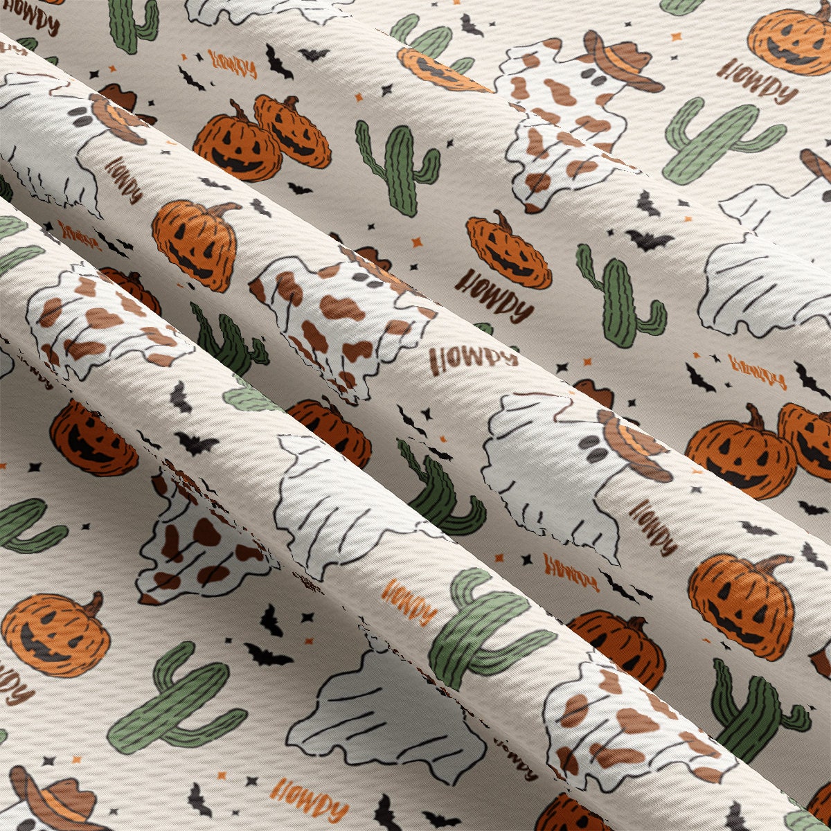 a pattern of pumpkins and cacti on a white background