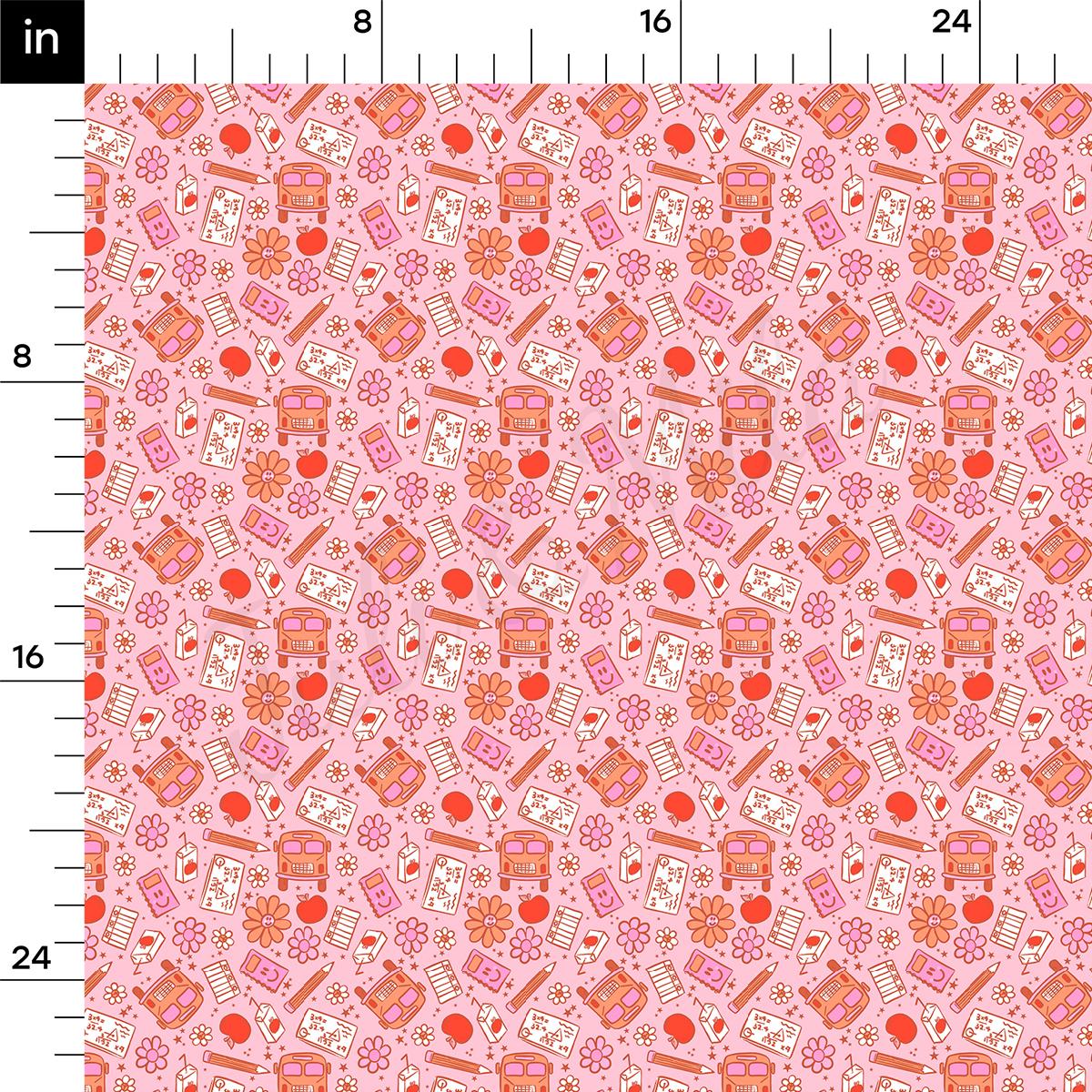 a pink and red pattern with a ruler