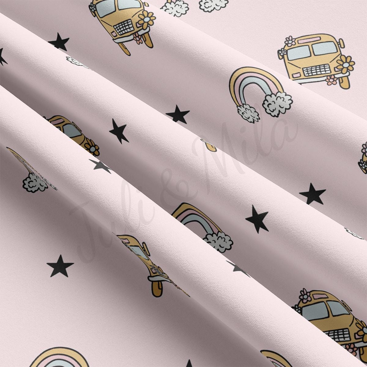 a close up of a pink wallpaper with black stars