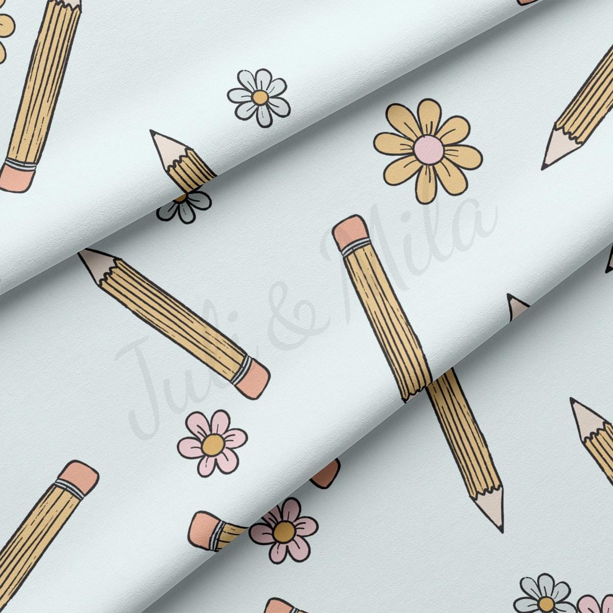 pencils and flowers on a white background