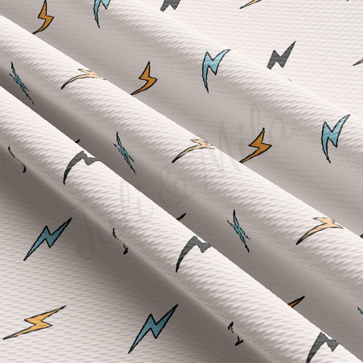 a close up of a white wallpaper with lightnings on it