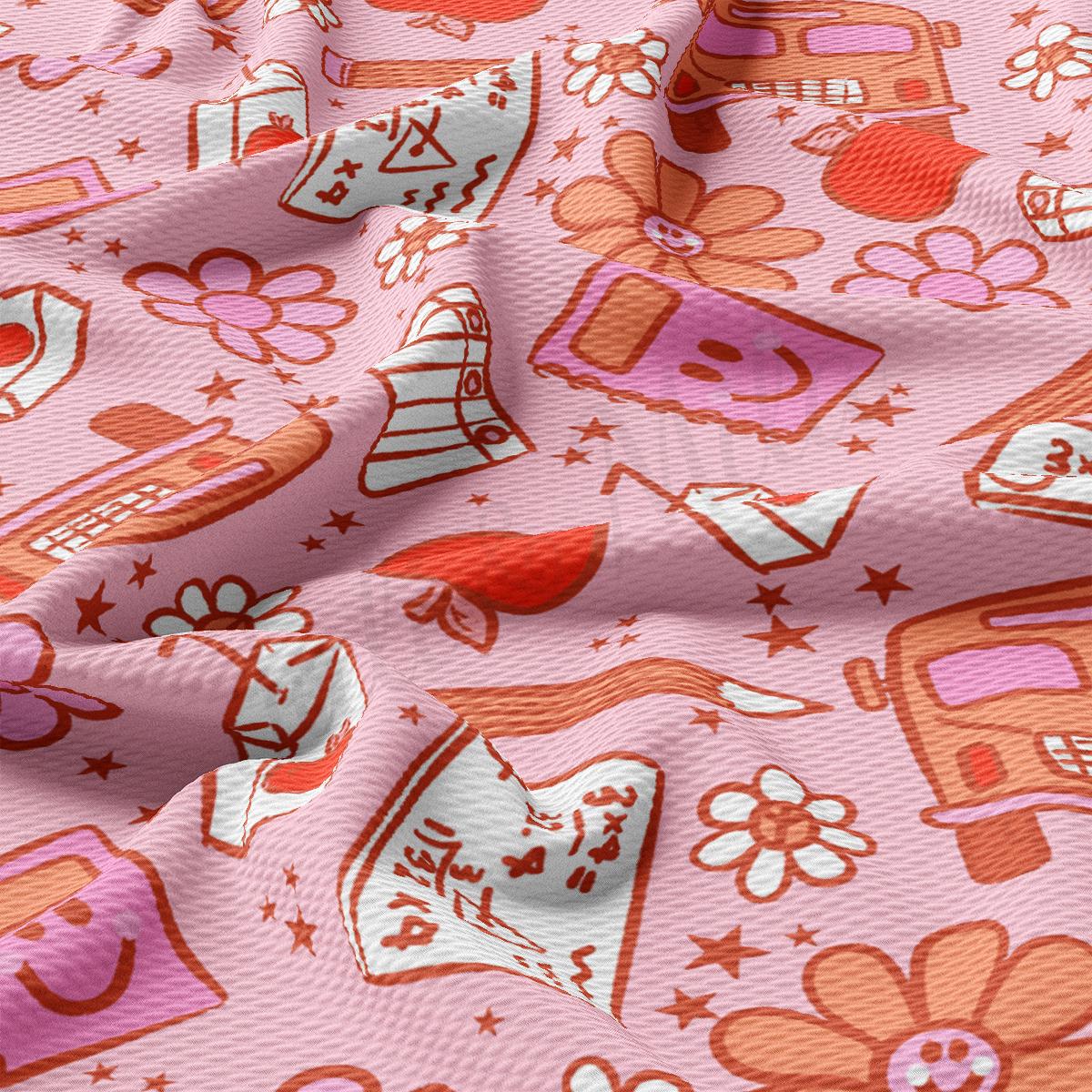 a close up of a pink and red pattern on a fabric