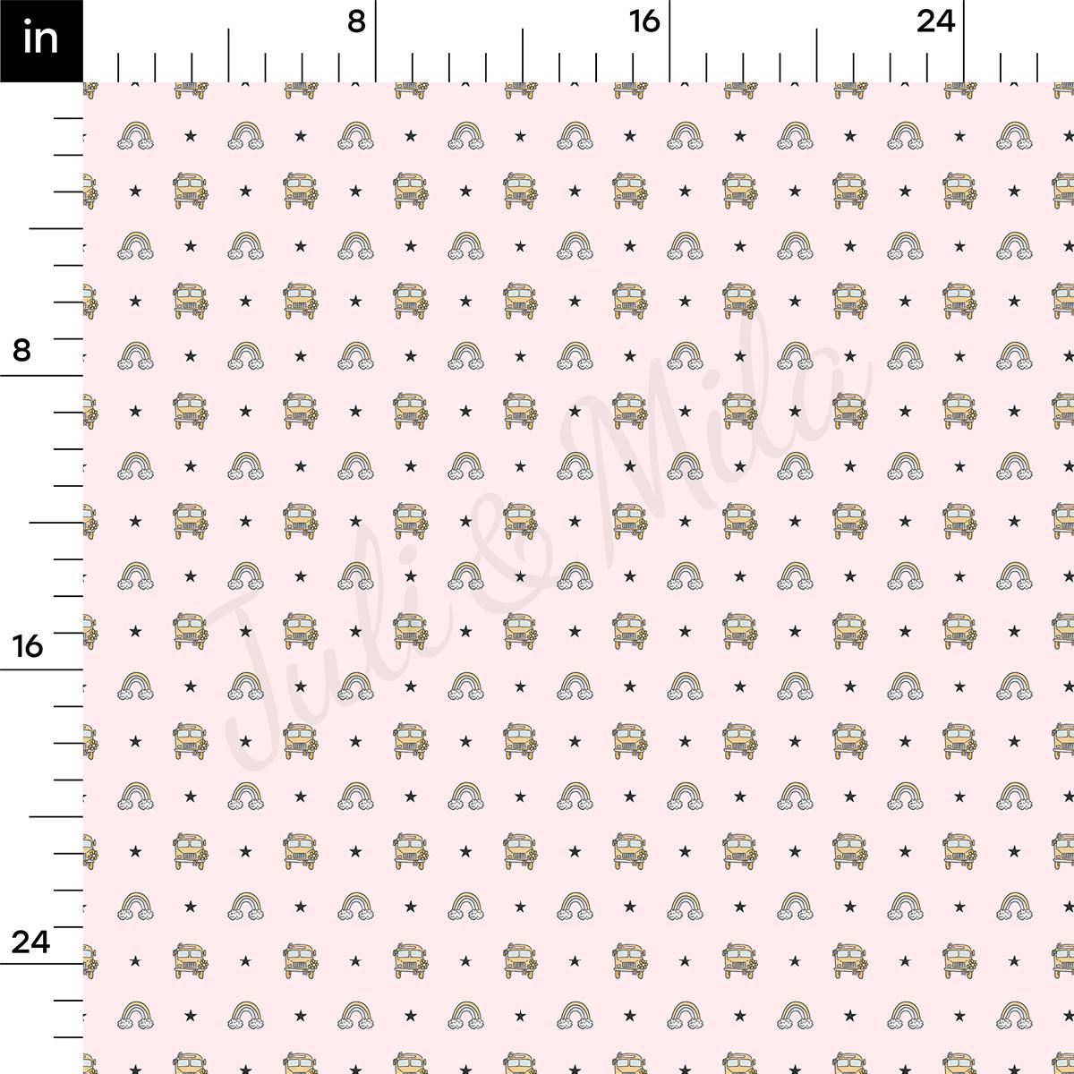 a ruler with elephants on it and a pink background
