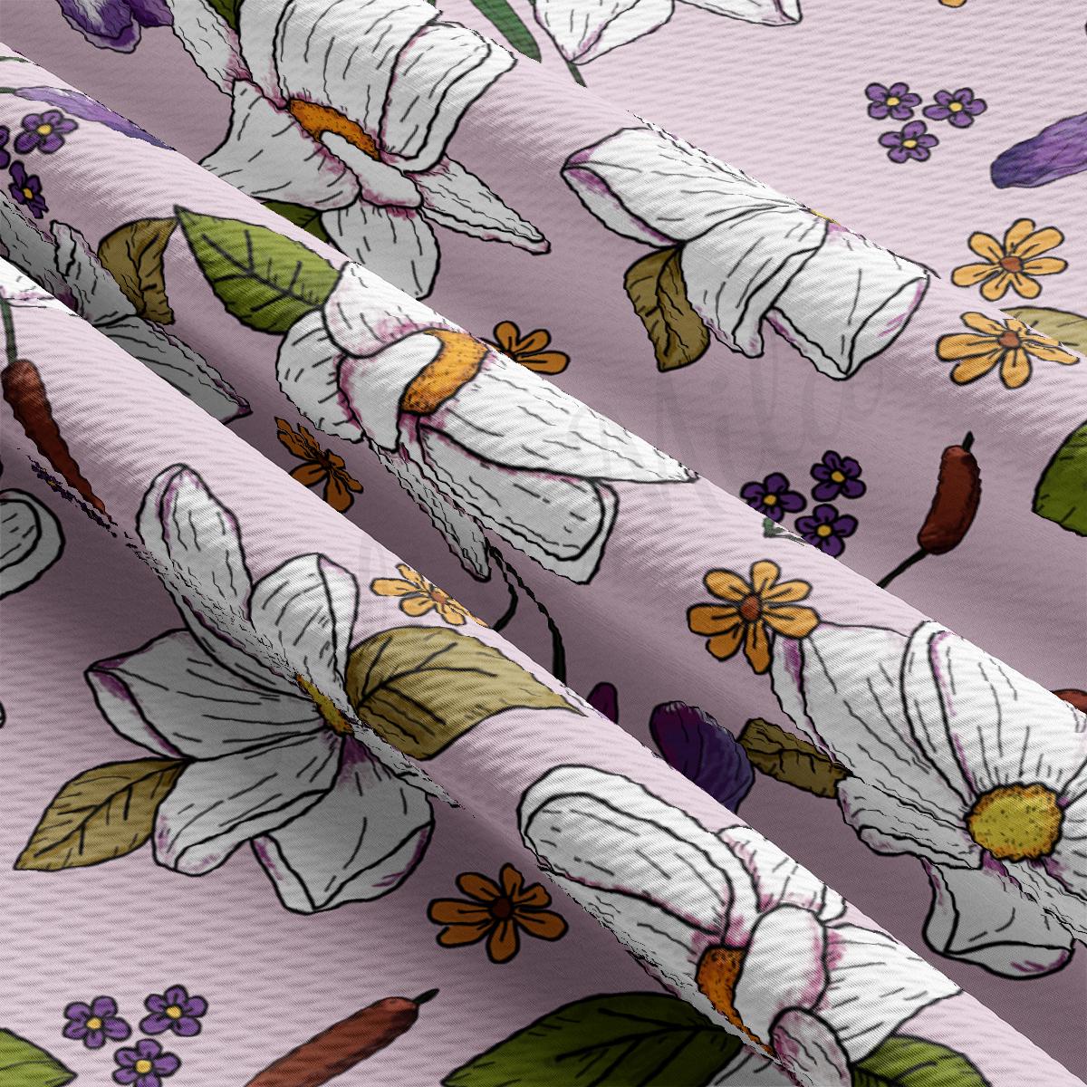 a close up of a flower pattern on a pink background