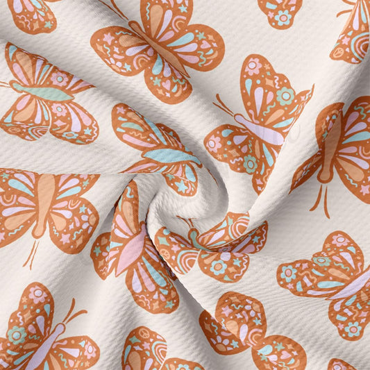 a close up of a butterfly print fabric