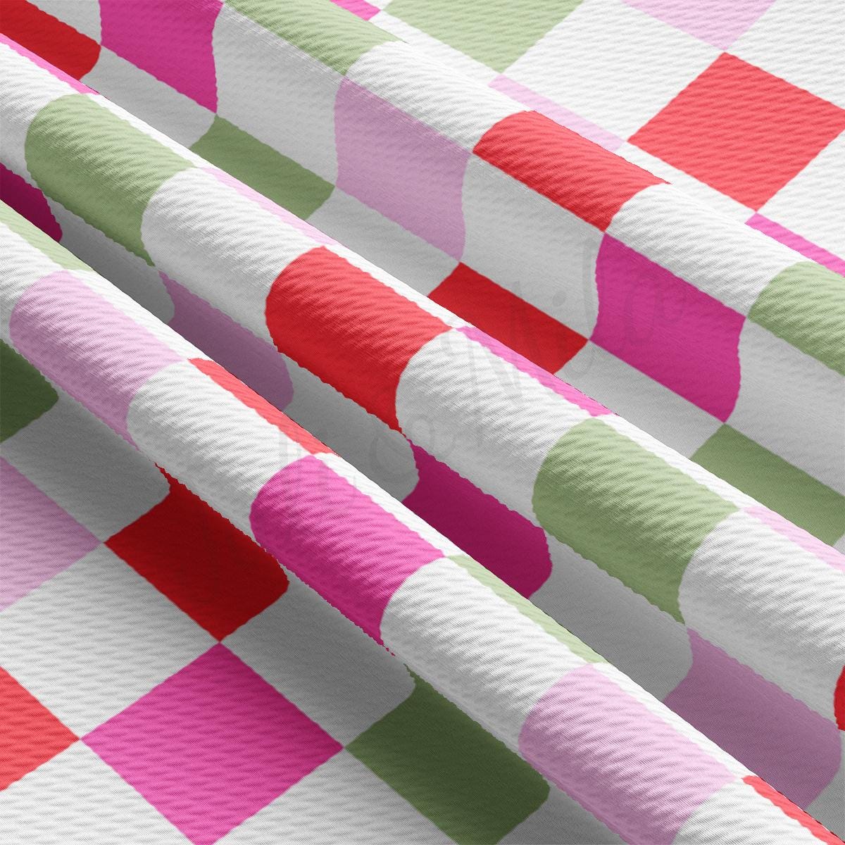 a close up of a pink, green, and white checkered fabric