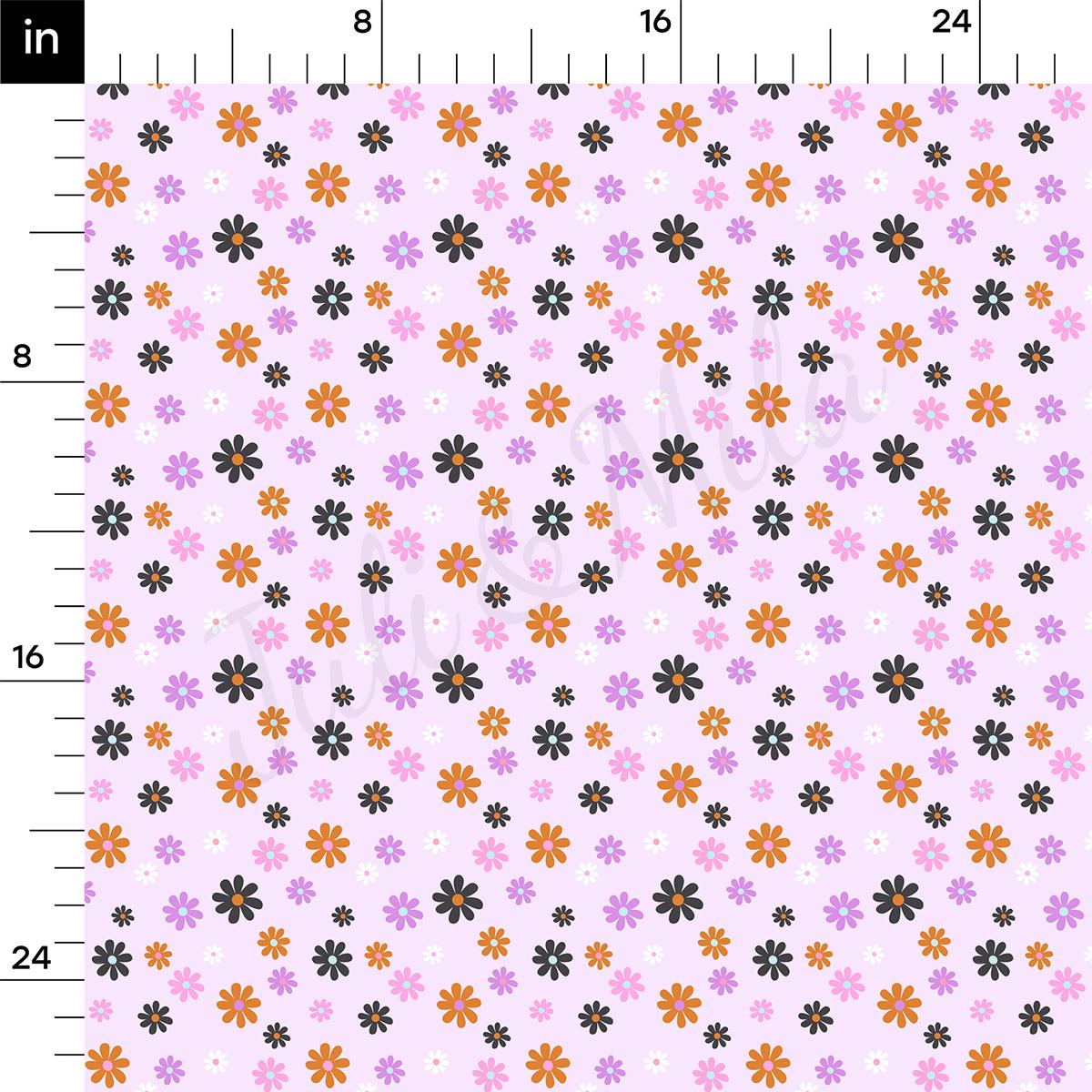 a ruler with a flower pattern on it