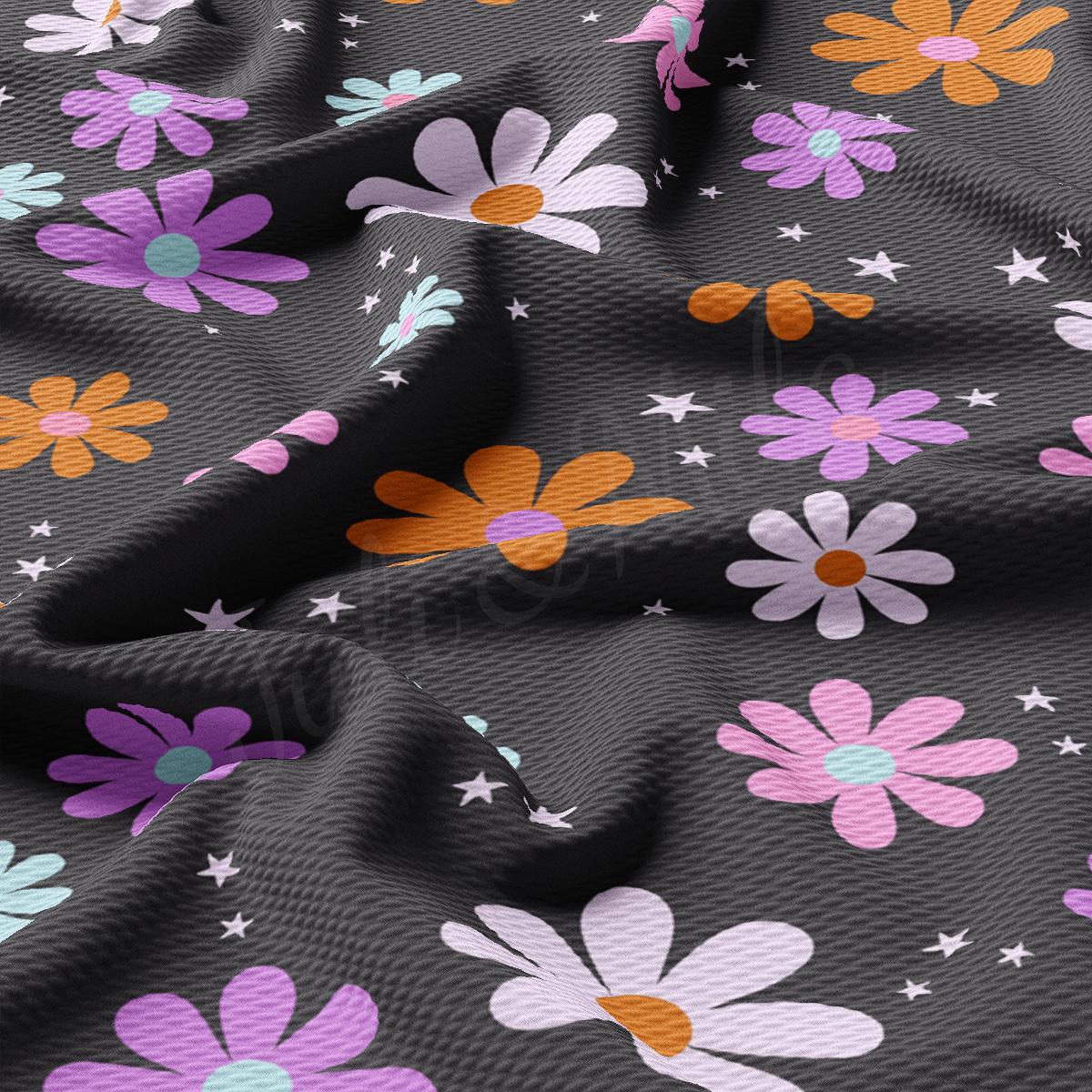 a close up of a fabric with flowers on it