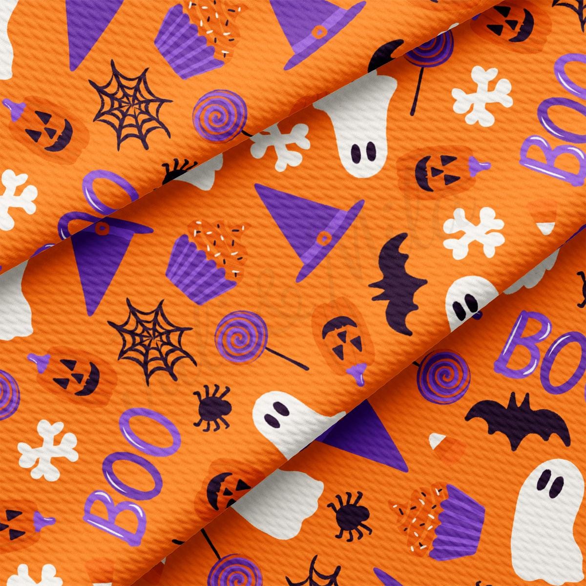 a close up of a pattern of halloween items