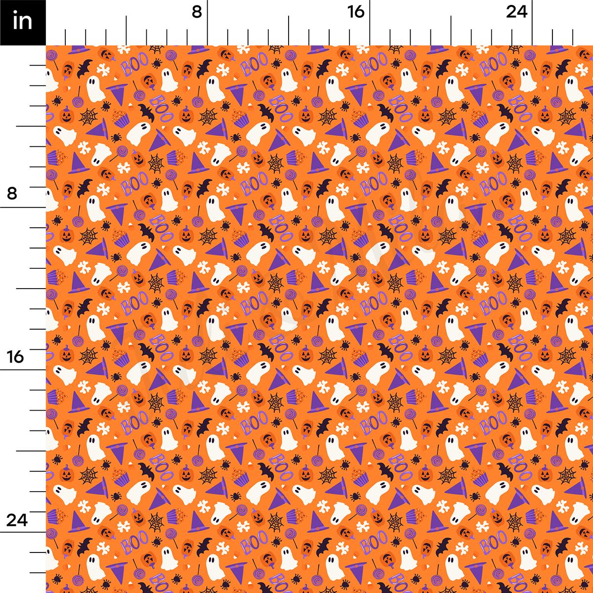 a ruler with a pattern of ghost and pumpkins on it