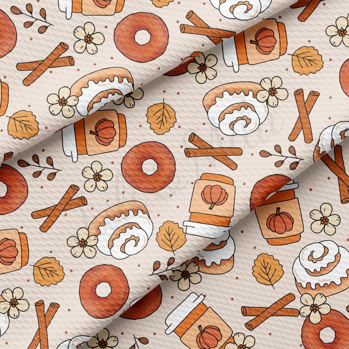 a close up of a pattern of donuts and donuts on a white background