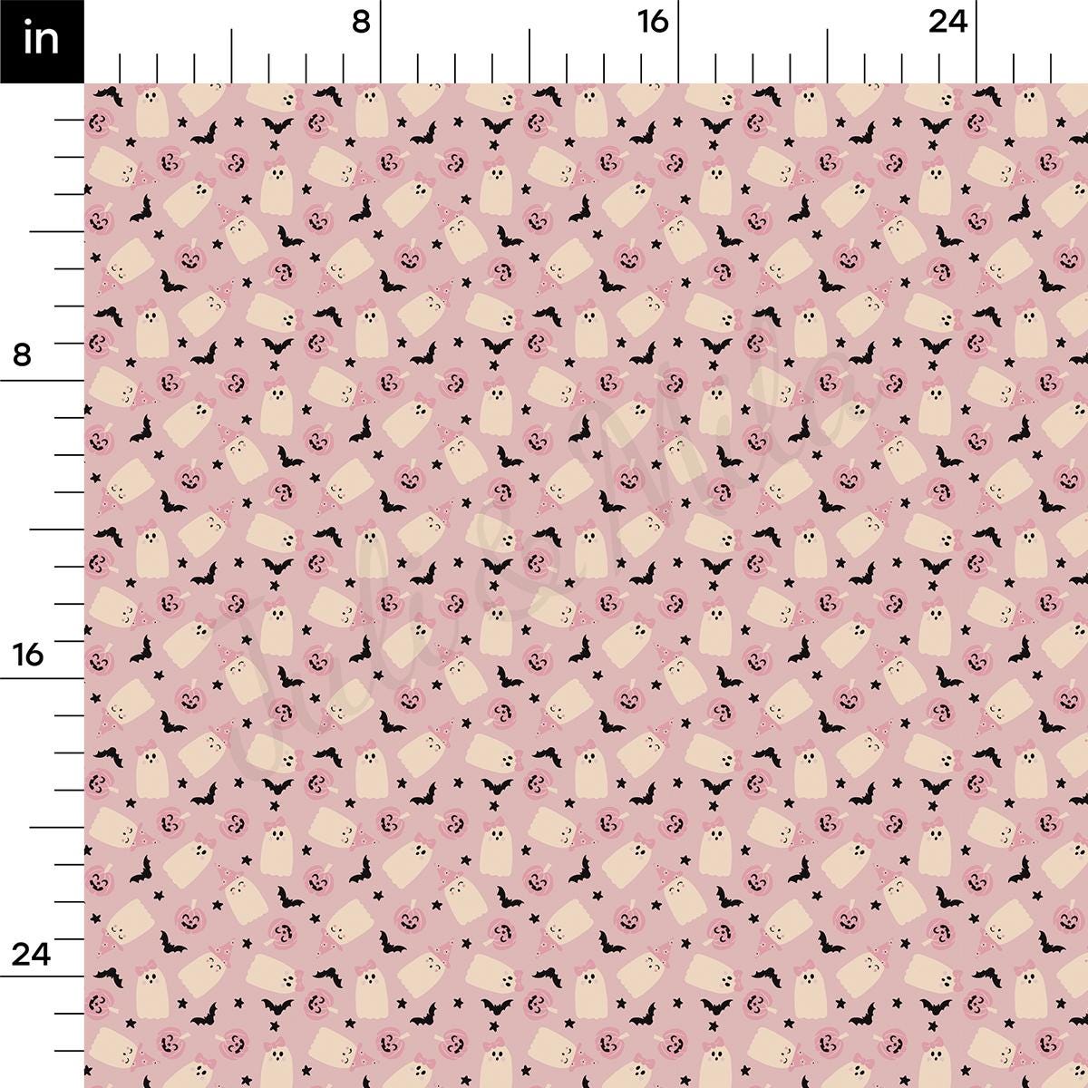 a ruler with a pink and black pattern on it