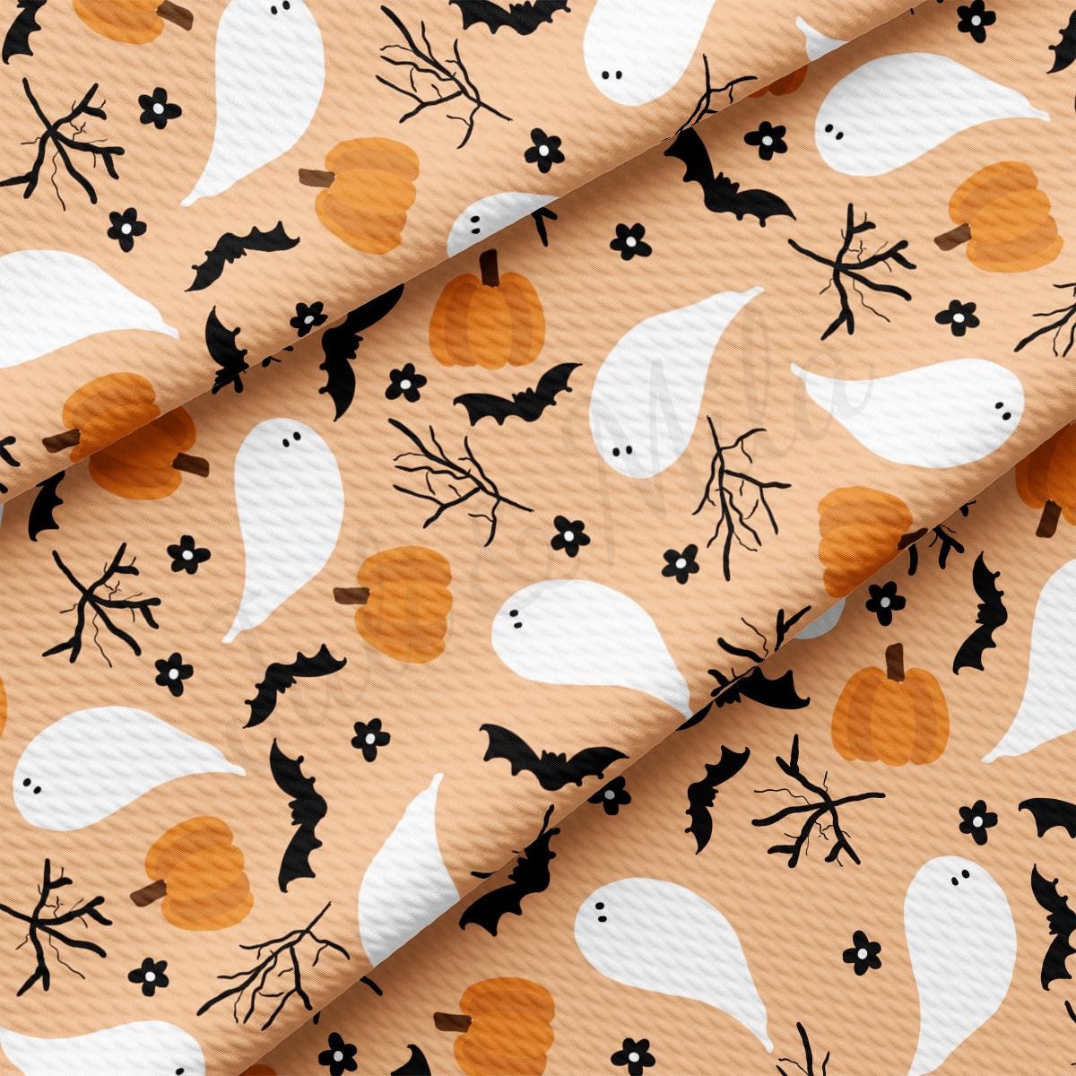 an orange and white halloween pattern with black and white pumpkins and bats