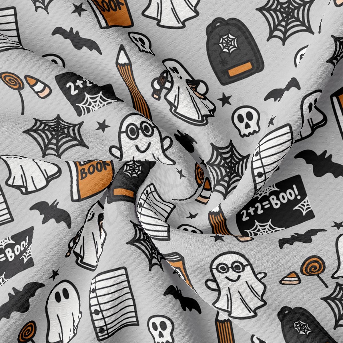 a pattern of halloween themed items on a white background
