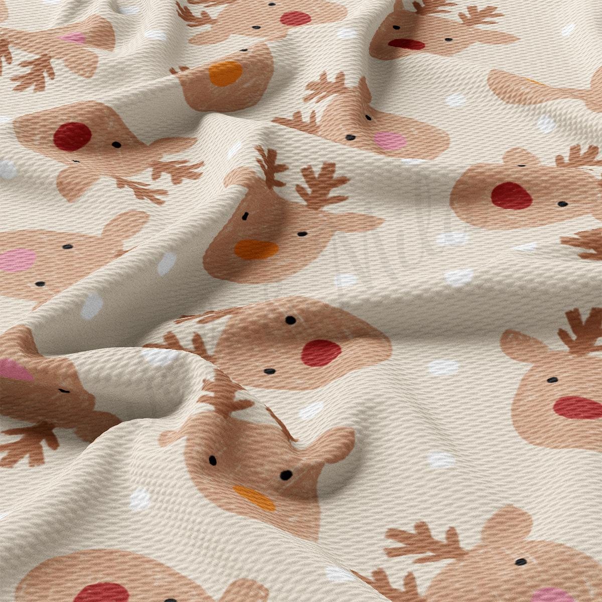 a close up of a fabric with reindeers on it