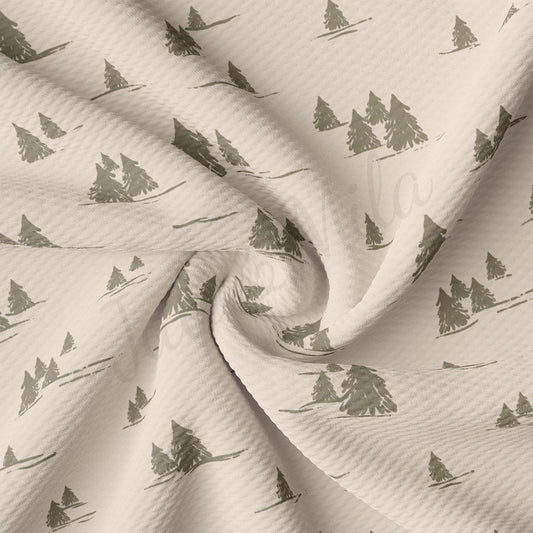 a white fabric with trees on it