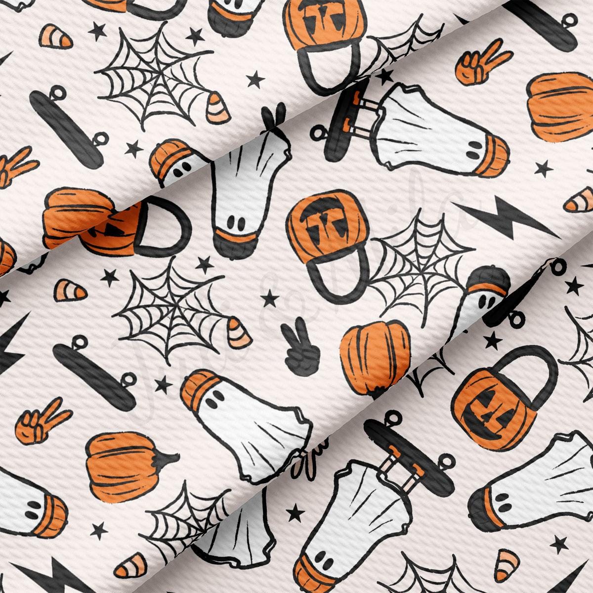 a white background with orange and black halloween items