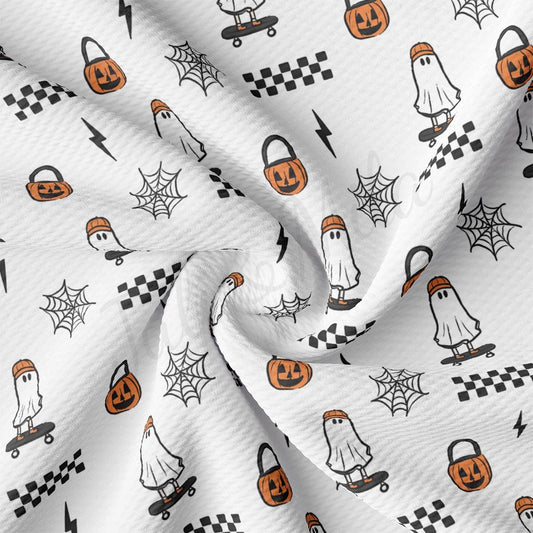 a white fabric with a pattern of ghost and pumpkins