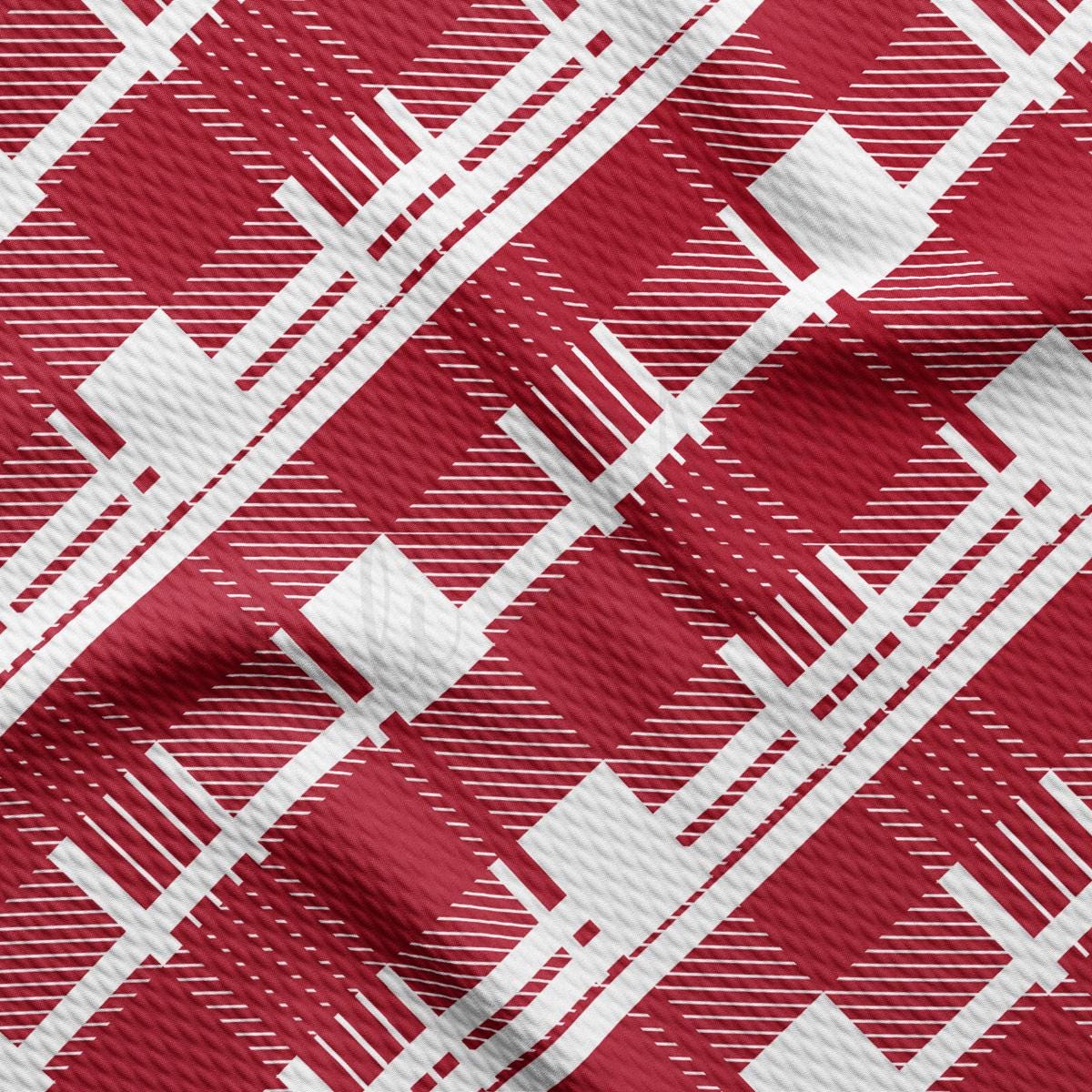 a red and white plaid fabric with white squares