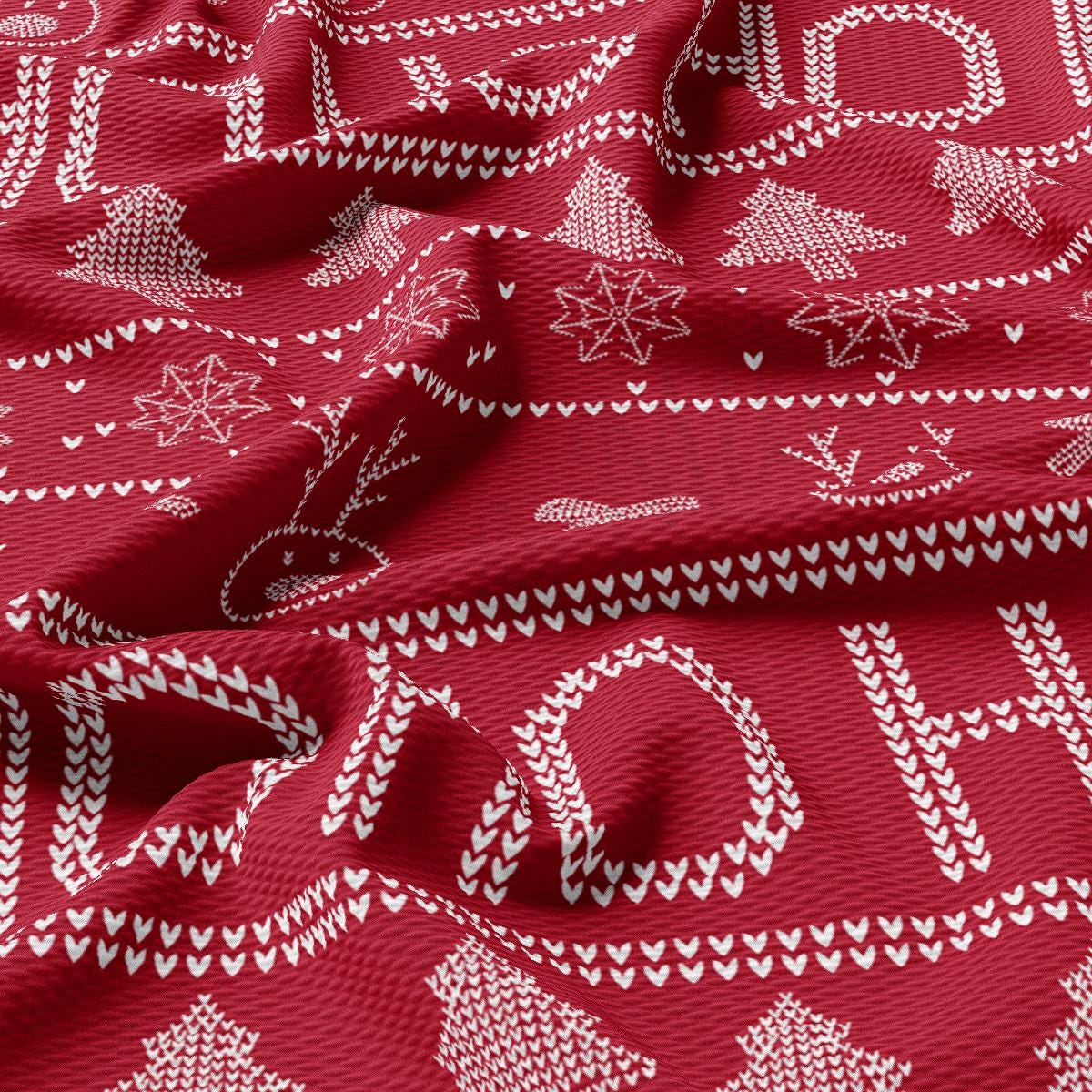 a close up of a red and white fabric