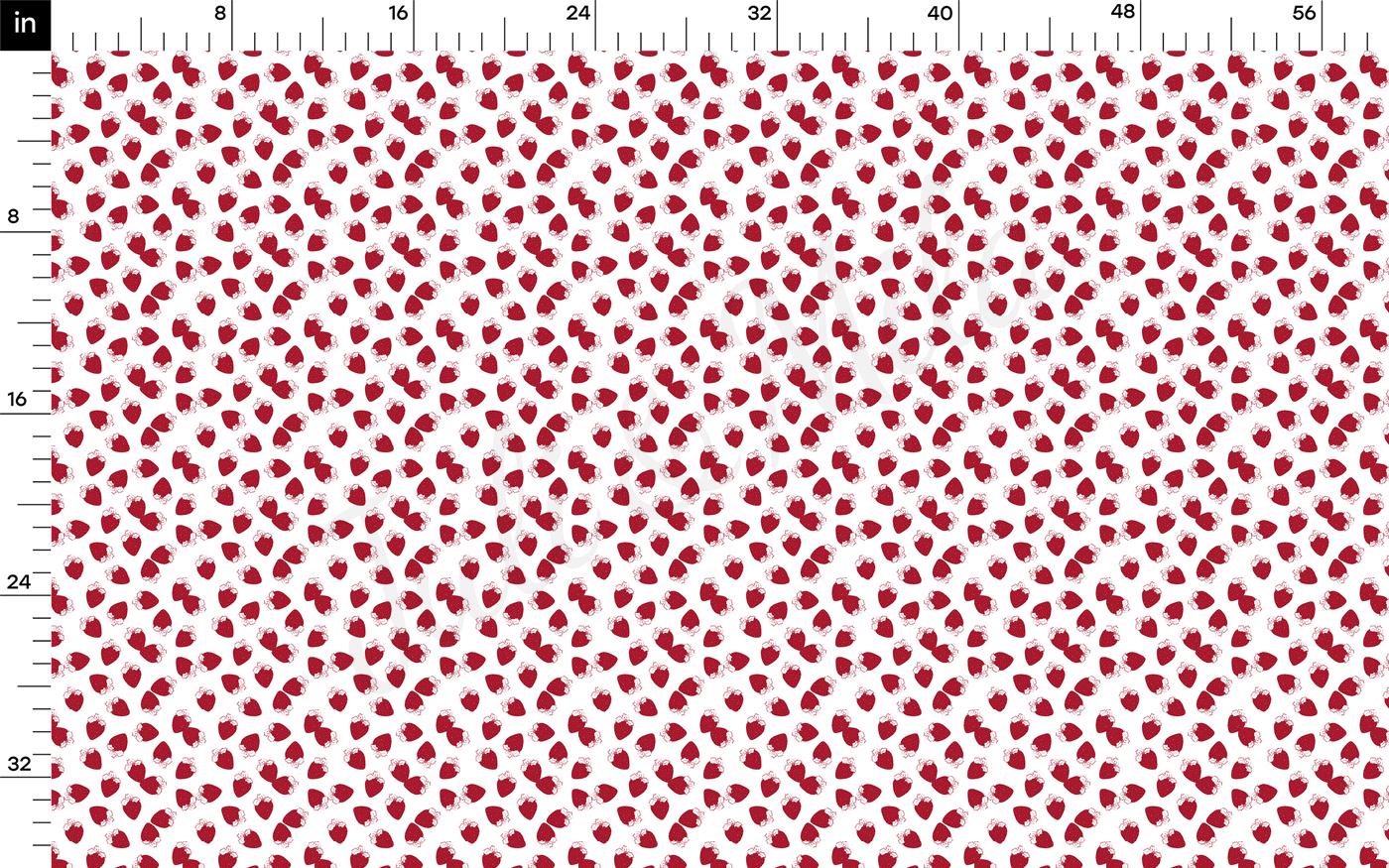 a red and white dotted background with a ruler