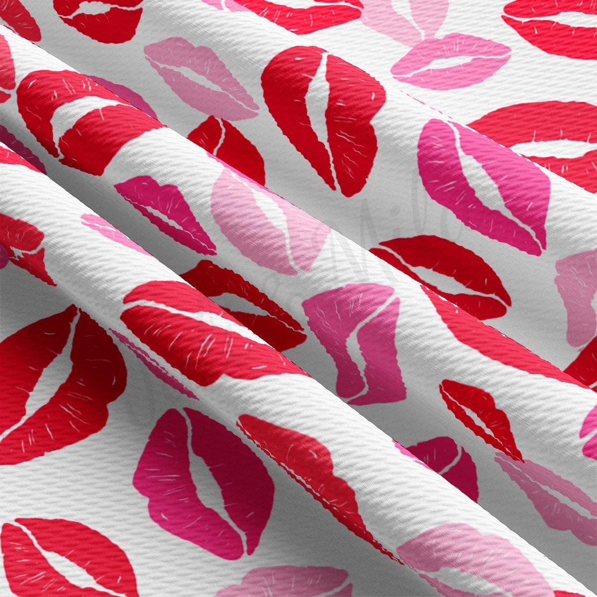 a close up of a red and pink lipstick print on a white background