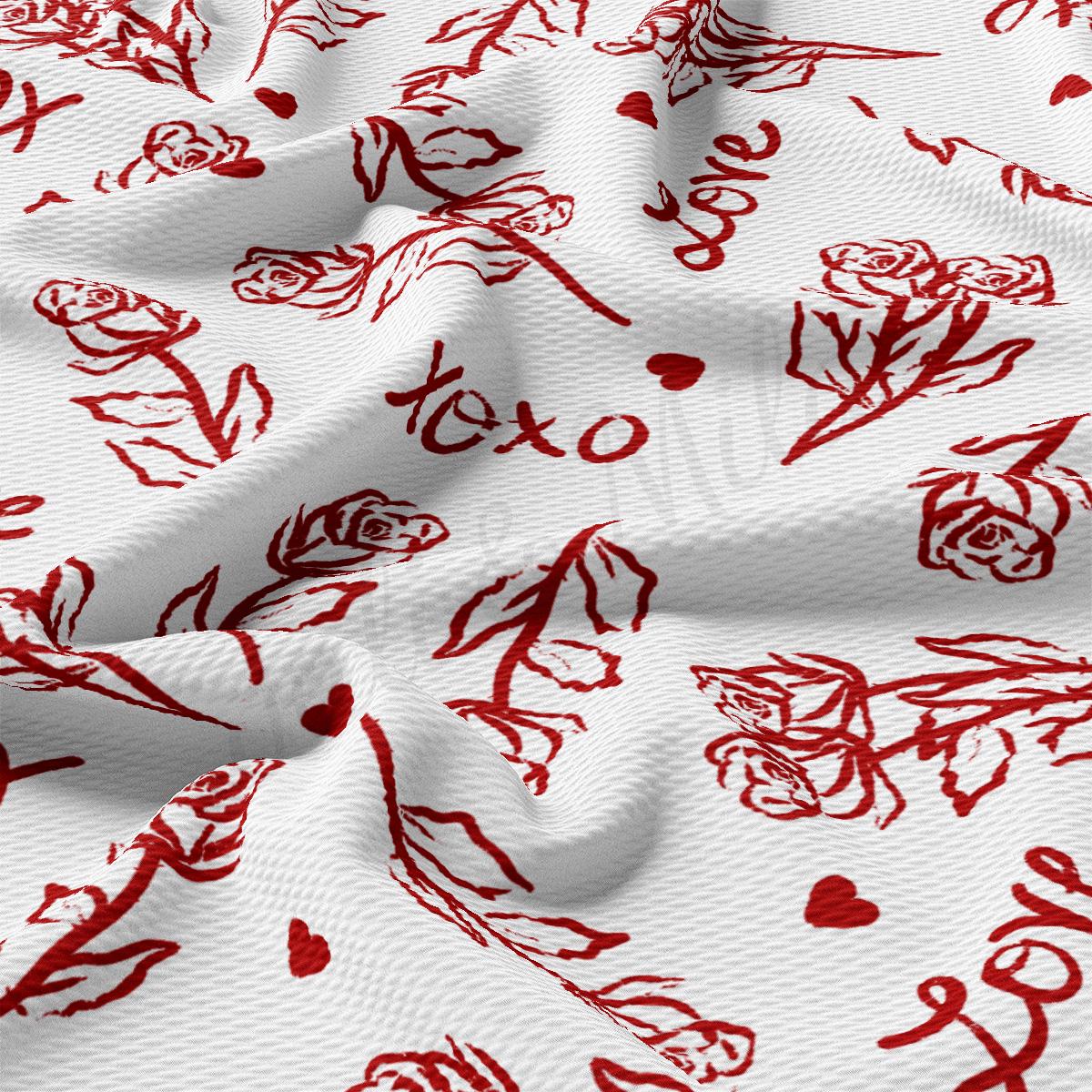 a white fabric with red roses on it