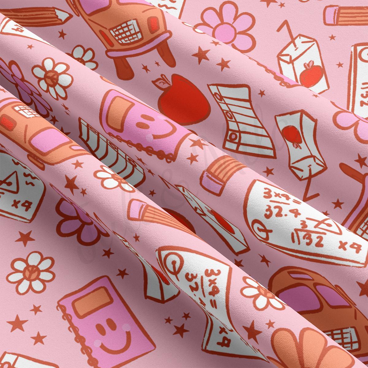 a close up of a pink wrapping paper