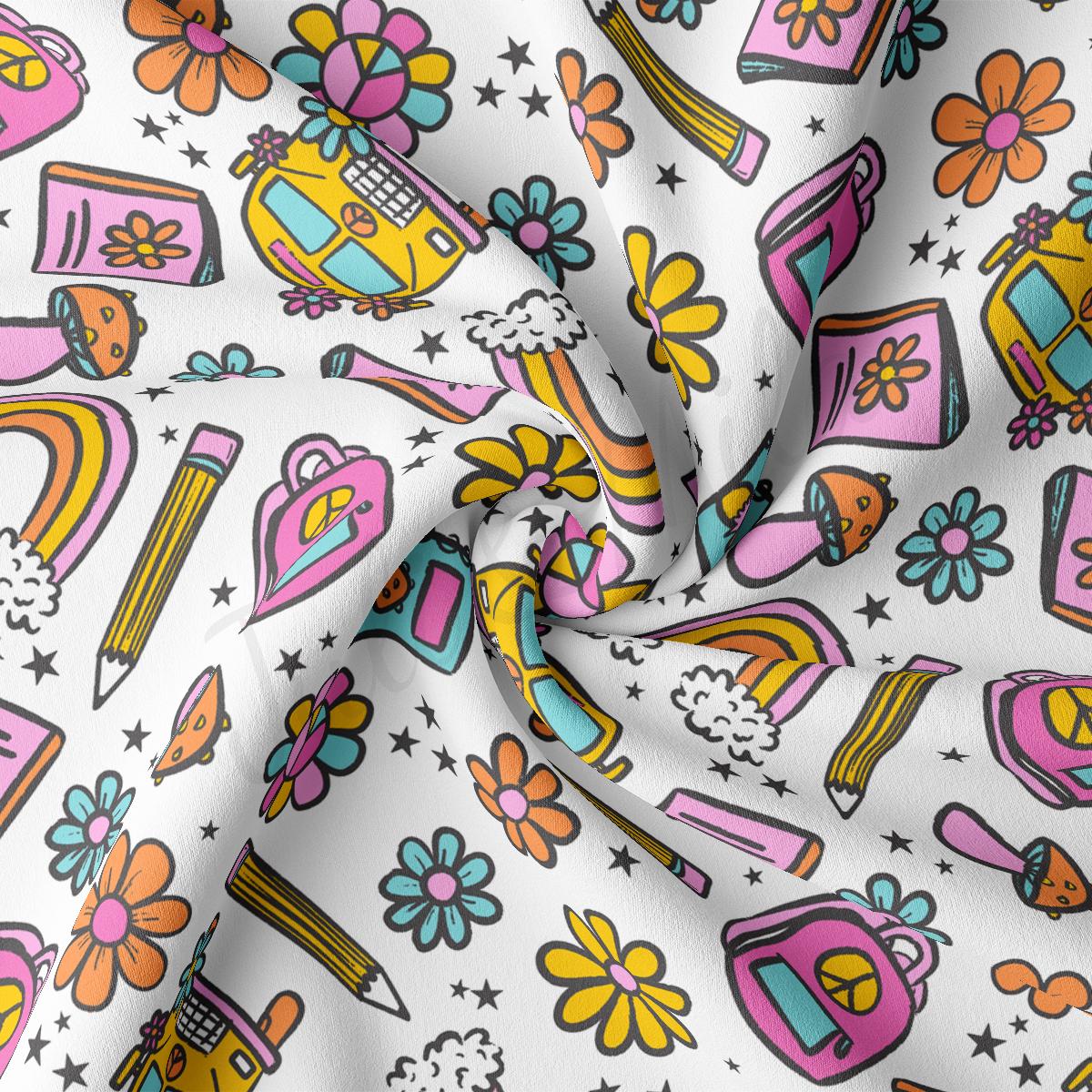 a close up of a white fabric with a colorful pattern