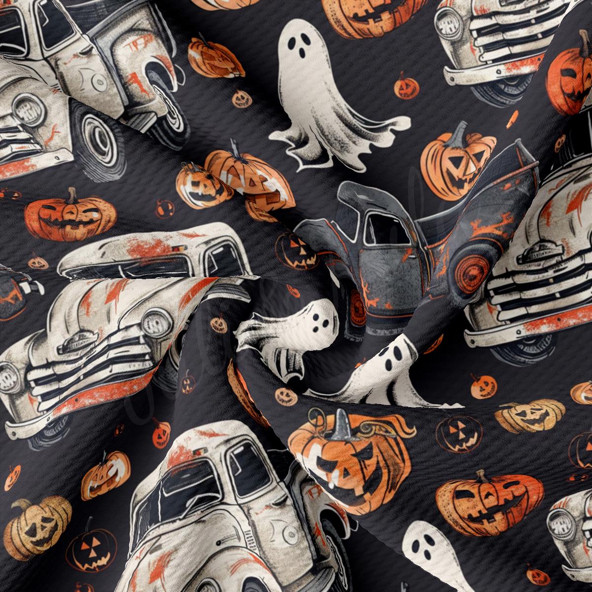 a black and orange halloween themed fabric