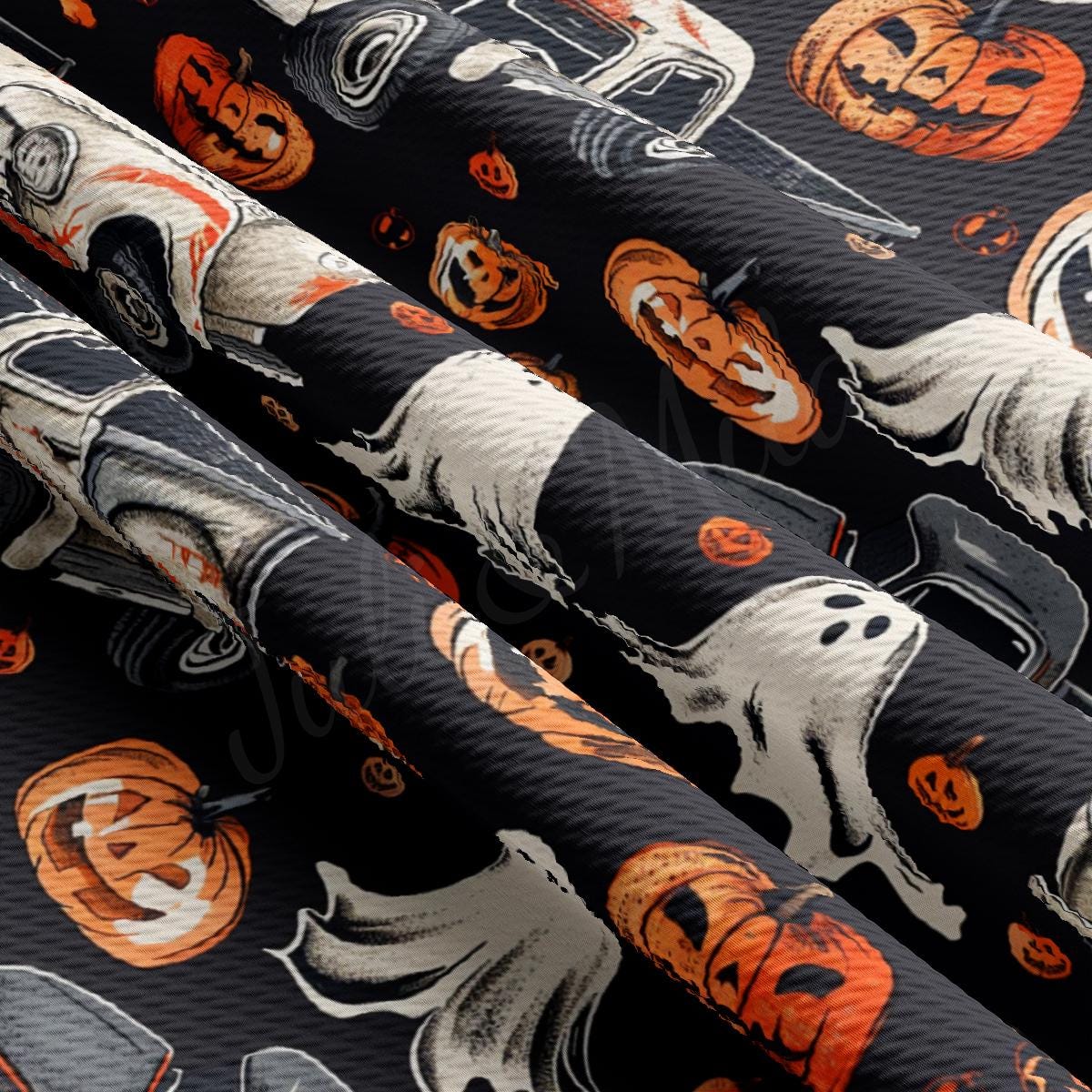 a close up of a bat with pumpkins on it