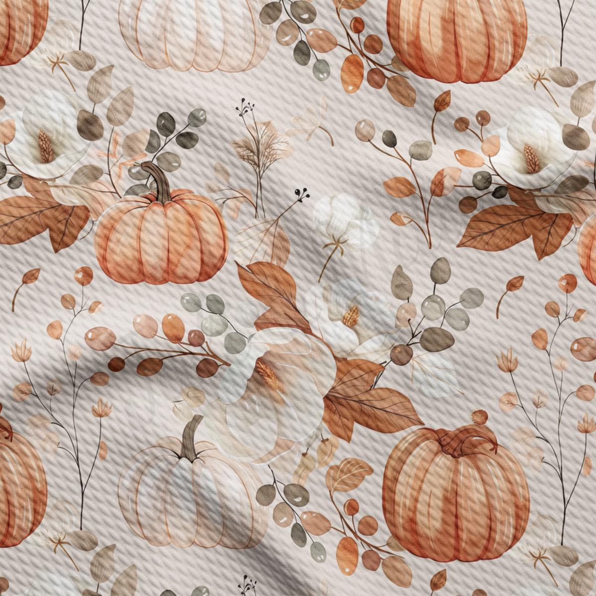 a pattern of pumpkins and leaves on a white background
