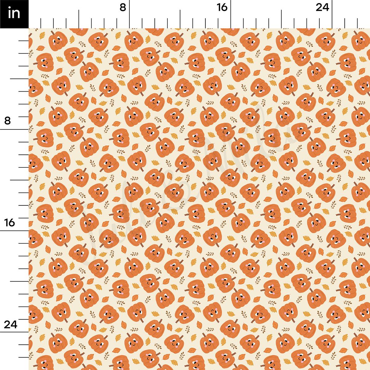 a ruler with an orange flower pattern on it