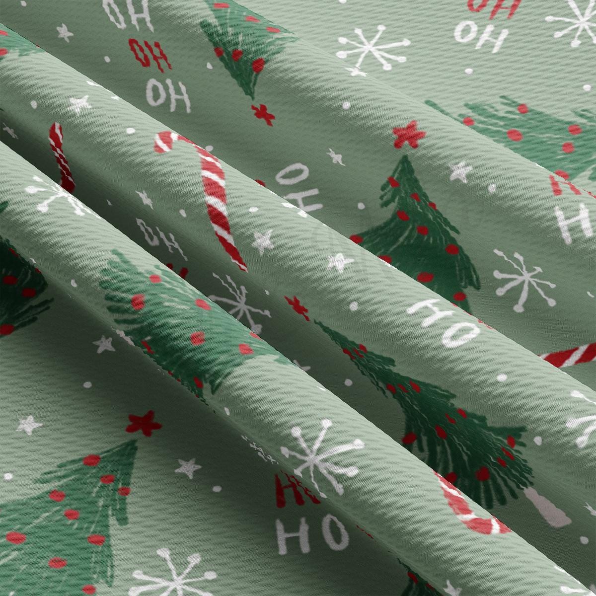 a close up of a green christmas wrapping paper