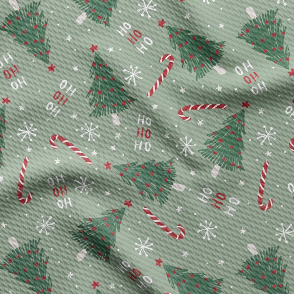 a pattern of christmas trees and candy canes