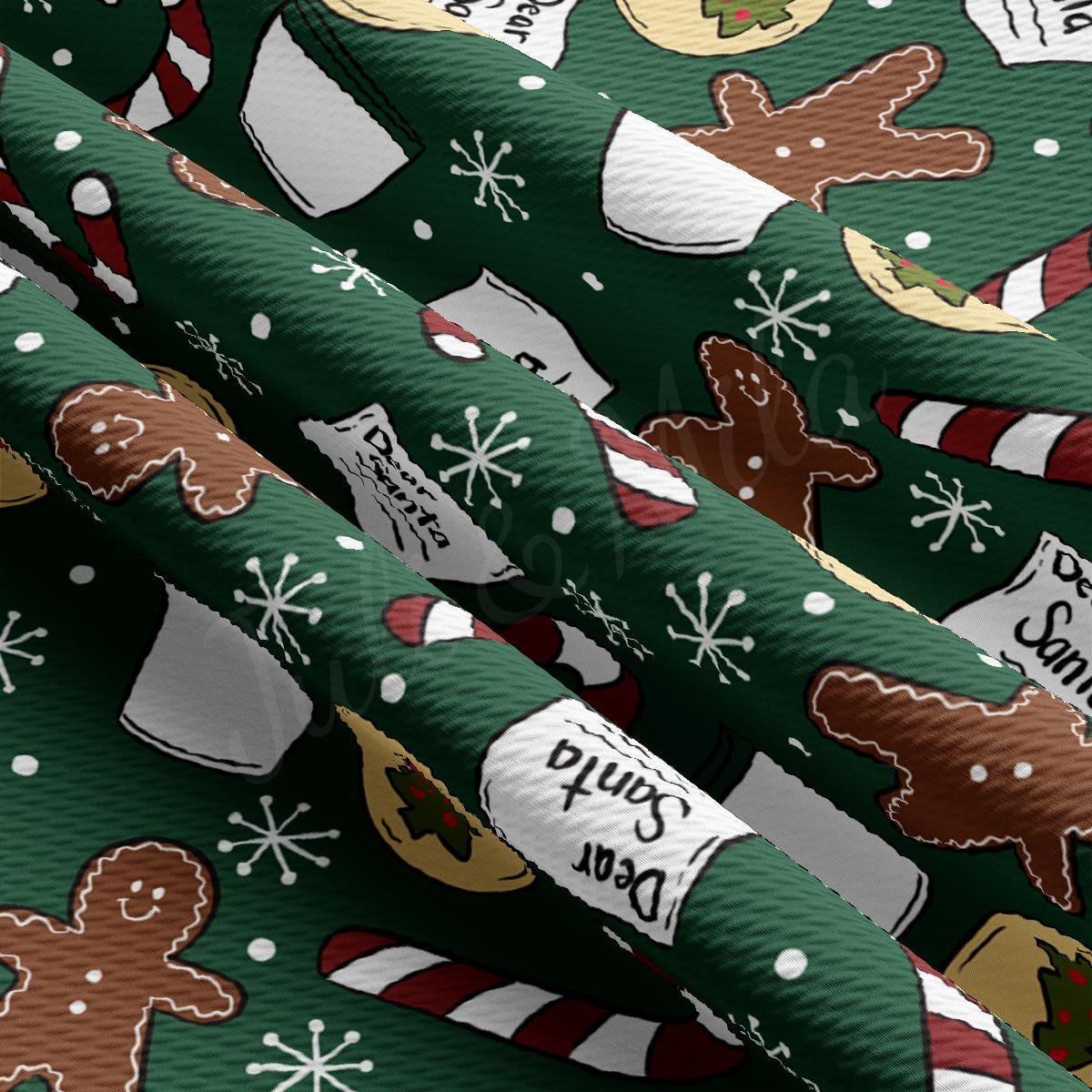 a close up of a green christmas wrapping paper