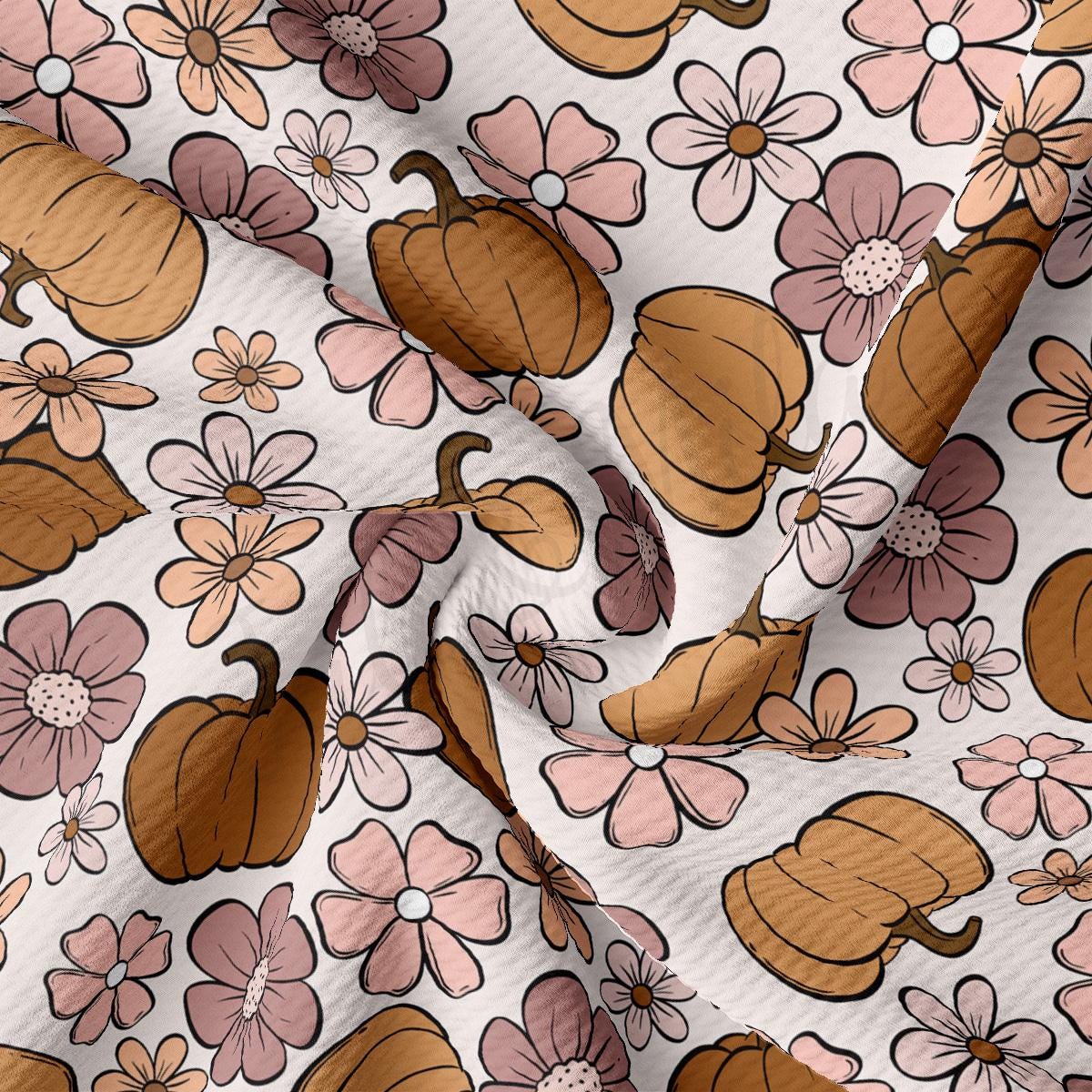 a close up of a flower and acorn print fabric