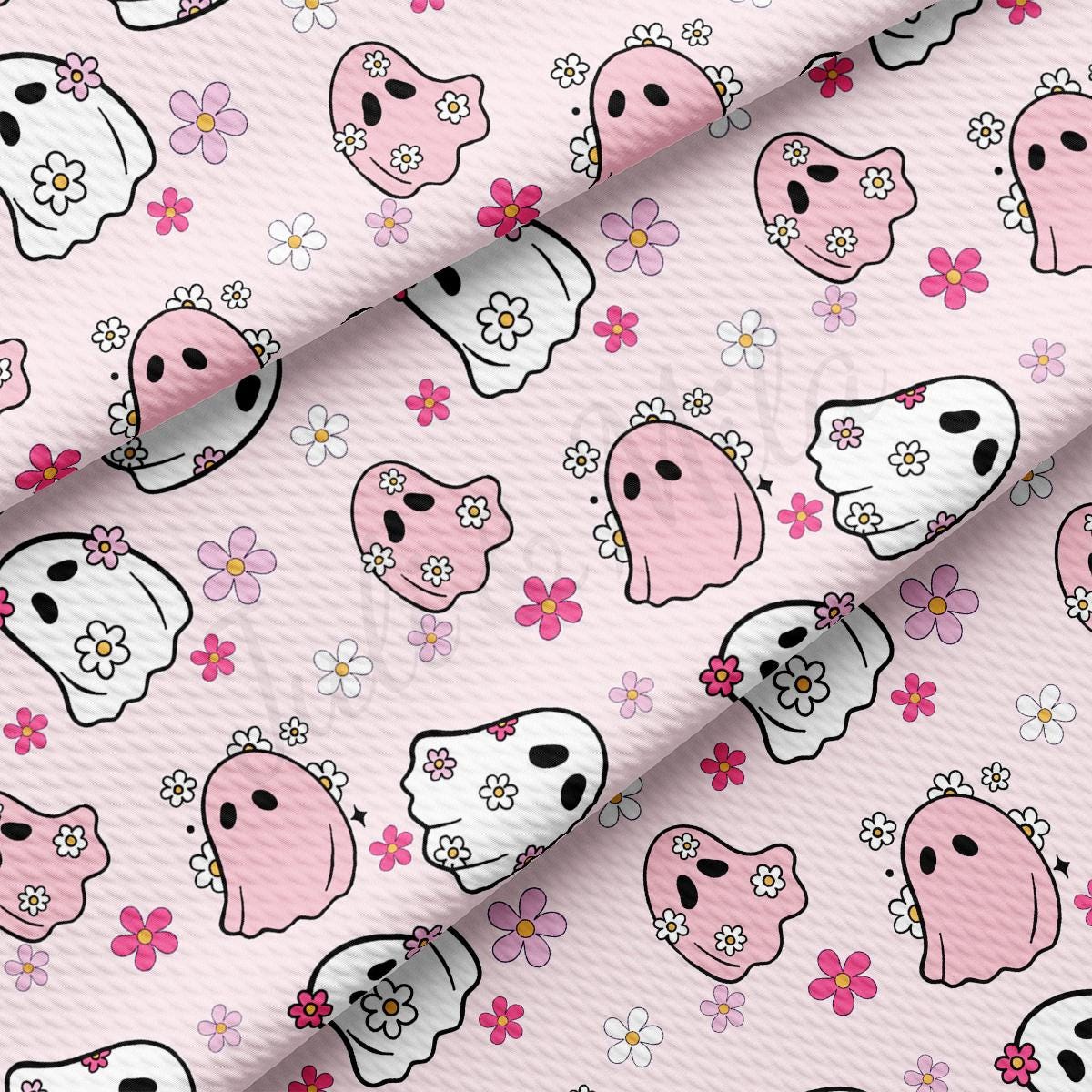 a pink background with skulls and flowers