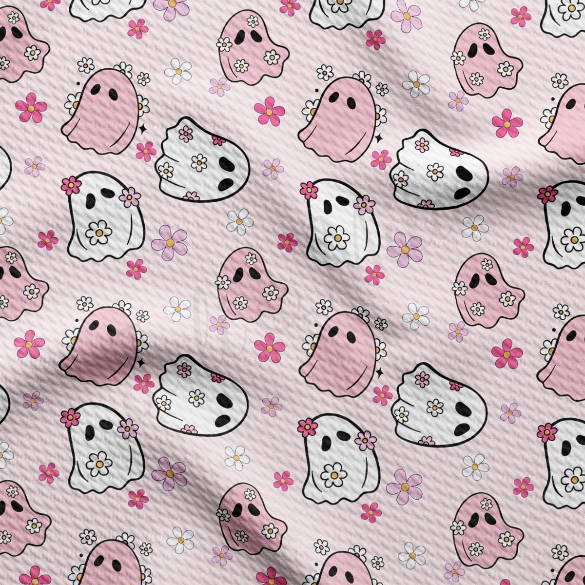 a pink background with skulls and flowers
