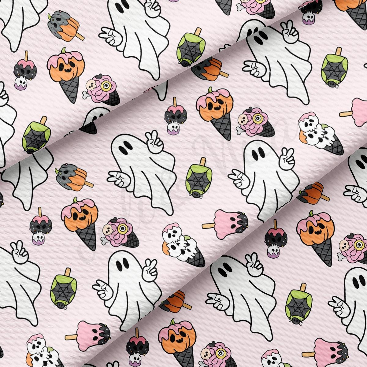 a pink background with a lot of halloween characters on it