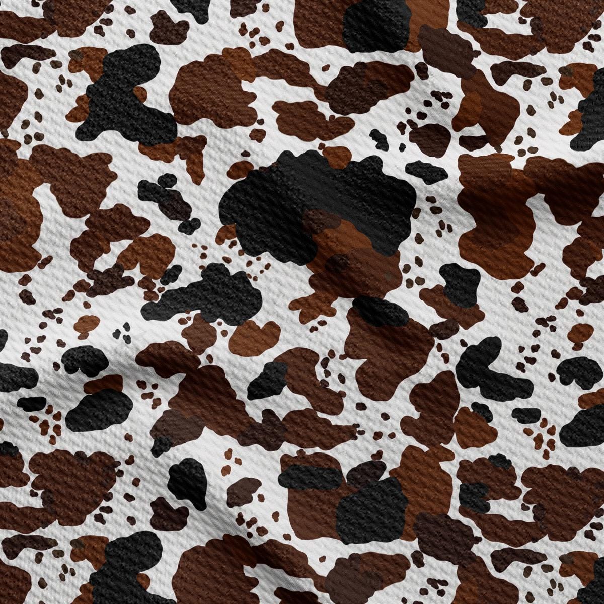 a brown and white animal print fabric