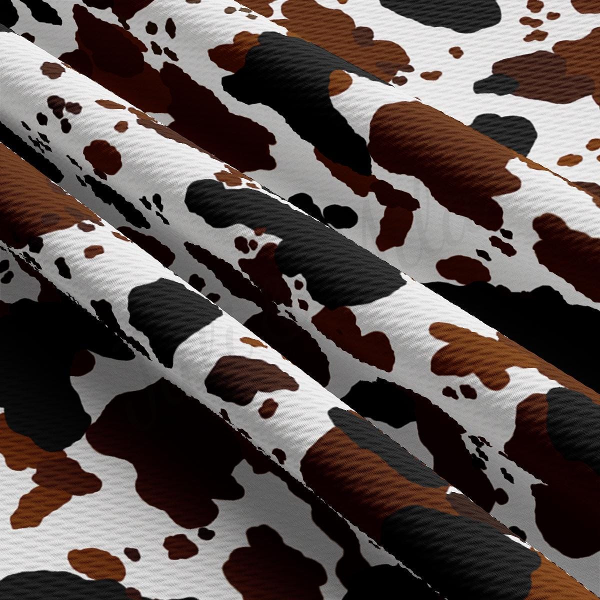 a close up of a pattern of brown and white paint