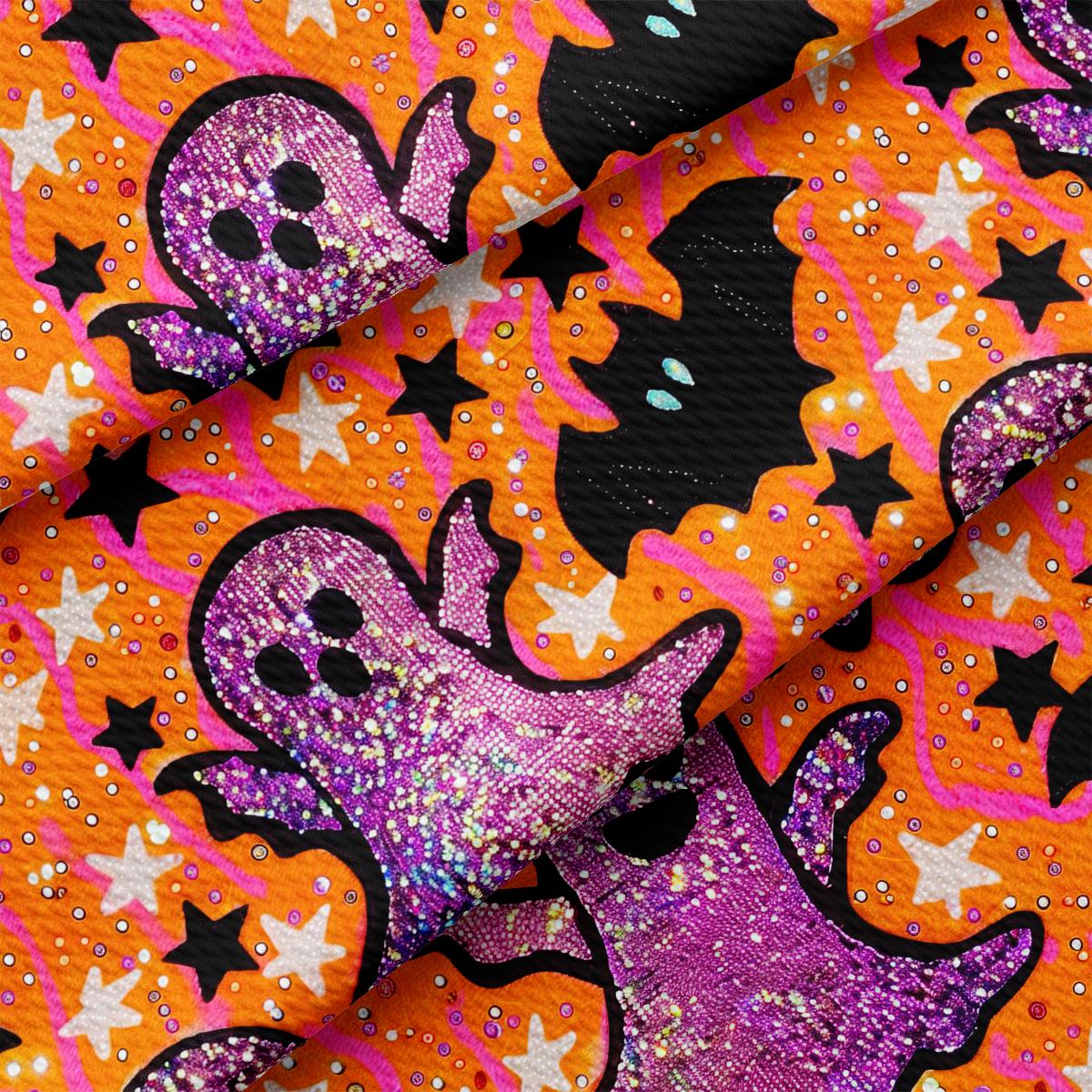 a purple and orange fabric with a ghost on it