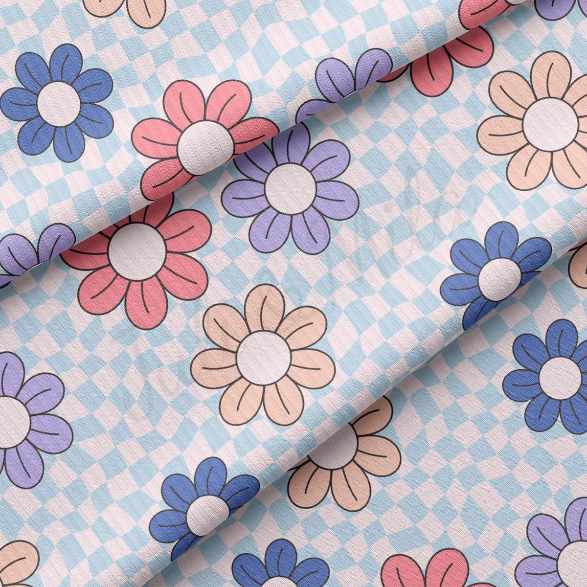 a close up of a flower pattern on a blue background