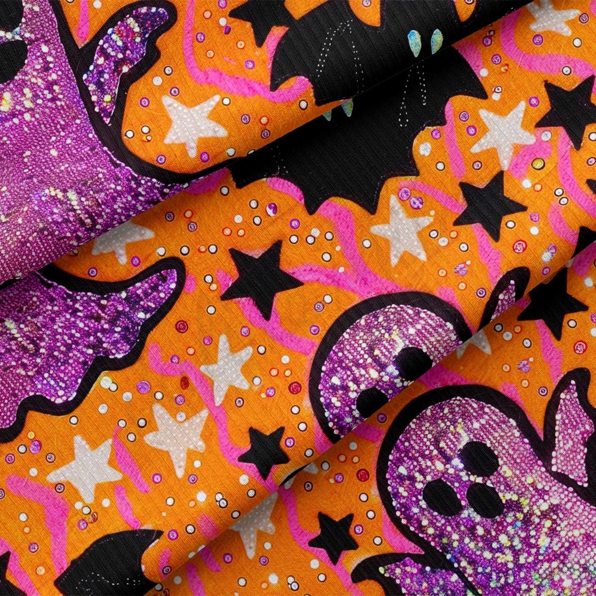 a close up of a purple and orange fabric