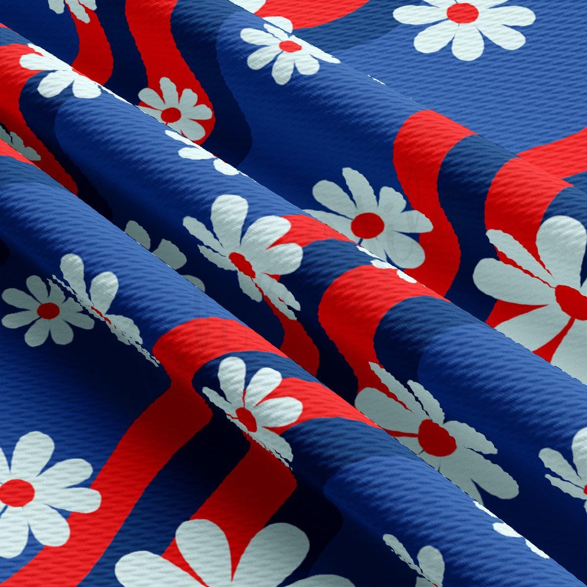 a red, white and blue flower pattern on fabric
