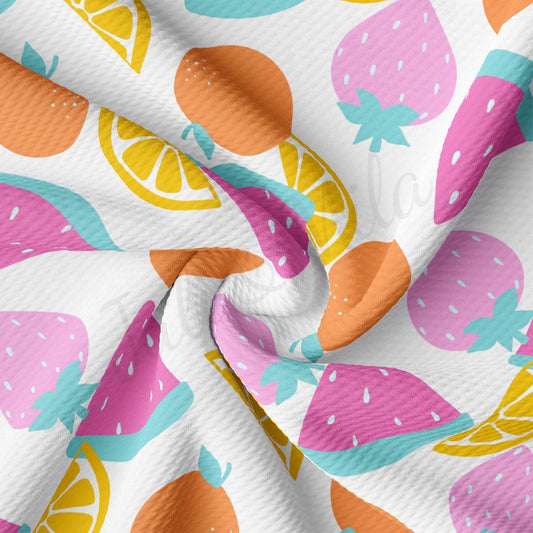 a close up of a pattern of fruit on a white background