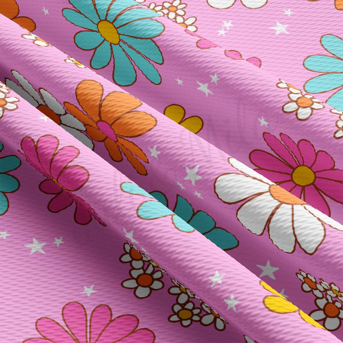 a pink background with colorful flowers and stars