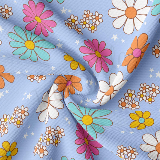 a blue background with flowers and stars